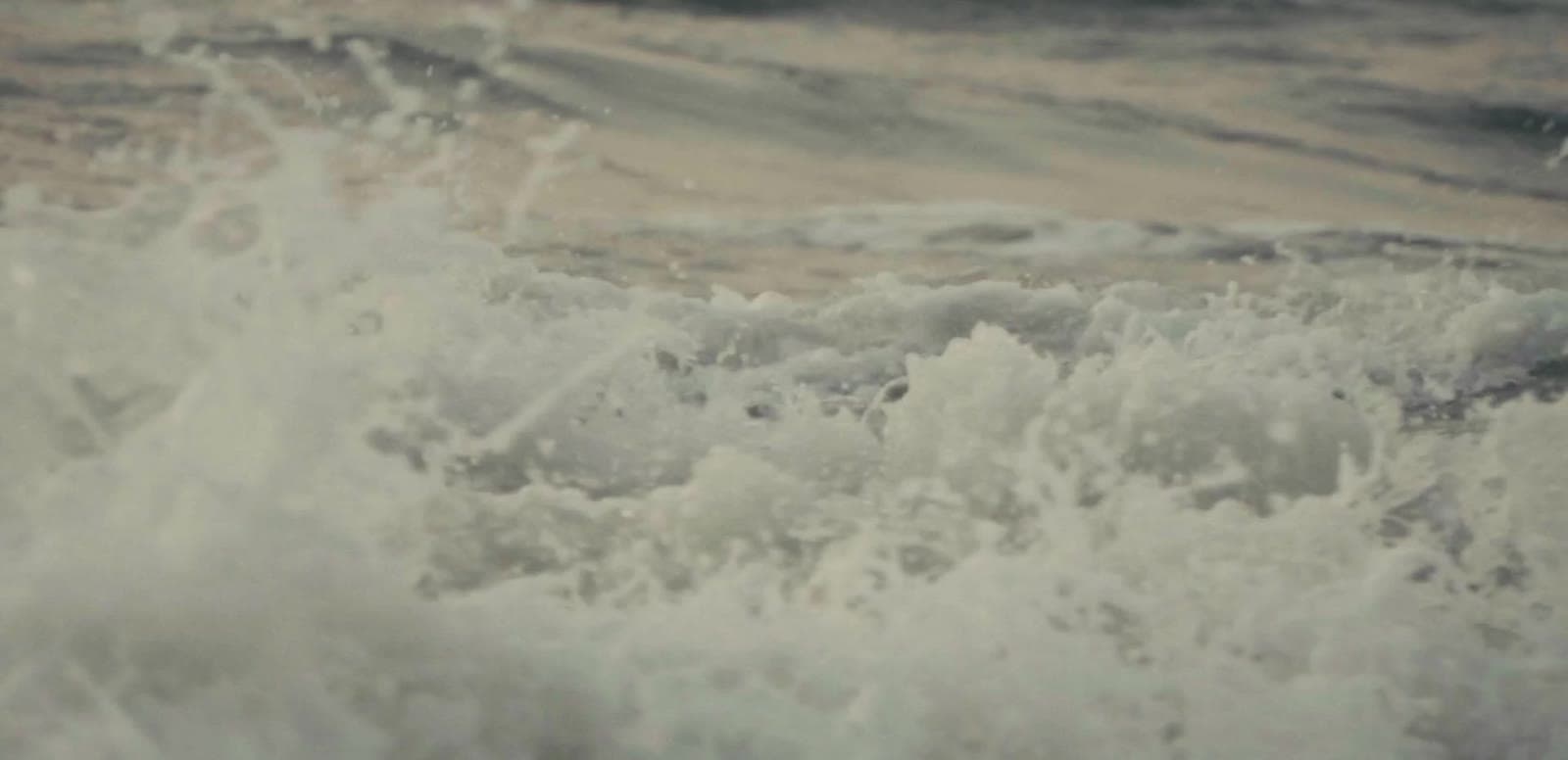 A wave breaking into white water